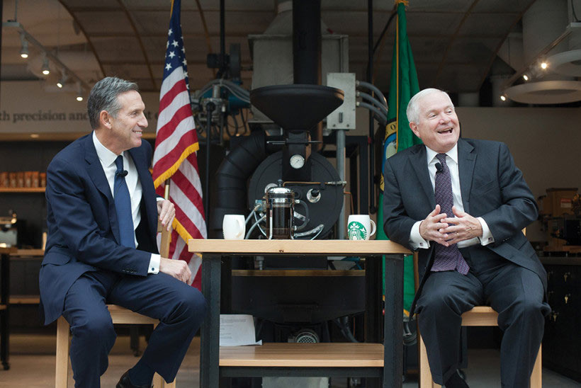 Starbucks CEO Howard Schultz (left) and former Secretary of Defense and W&M Chancellor Robert M. Gates ’65